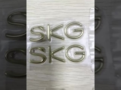 टी-शर्ट के लिए कस्टम सिल्वर गोल्ड टीपीयू हीट ट्रांसफर 3 डी एम्बोस्ड लोगो लेबल