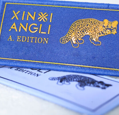 कस्टम फैब्रिक सिल्क स्क्रीन प्रिंटेड लेबल - तेंदुए पैटर्न ब्रांड लोगो परिधान पैच के लिए कपड़ों के सामान